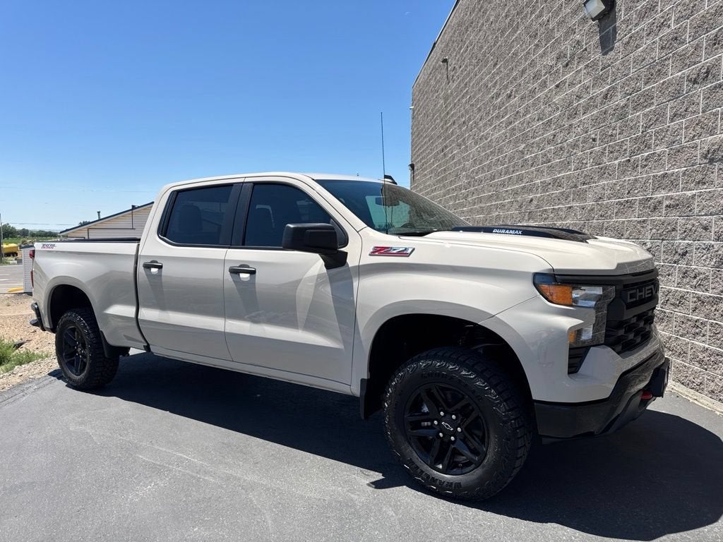 2026 Chevrolet Silverado 1500 Custom Trail Boss in White Sands — front three-quarter view