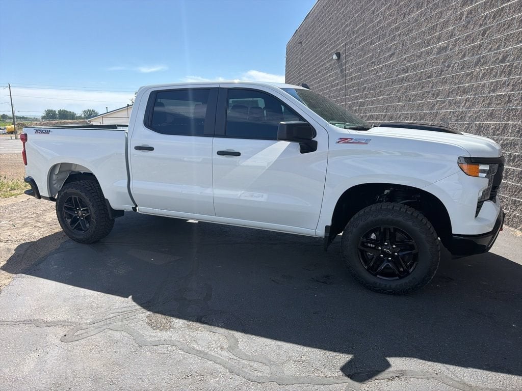 2026 Chevrolet Silverado 1500 Custom Trail Boss in Summit White — front three-quarter view